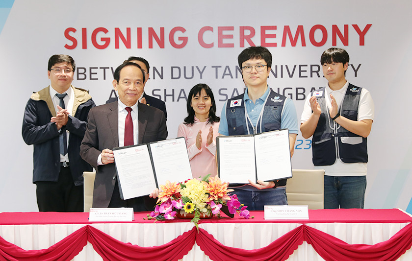 Lễ ký kết hợp tác giữa Đại học Duy Tân với Tổ chức Phi Chính phủ Cánh đồng Yêu thương - Share Sarangbat
